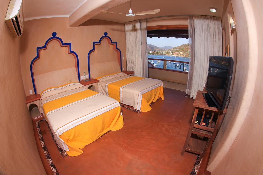 Villa del Pescador Zihuatanejo Quarto foto